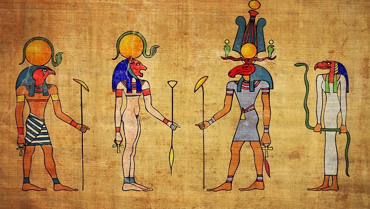 A painting of four Egyptian gods with animal heads on papyrus.