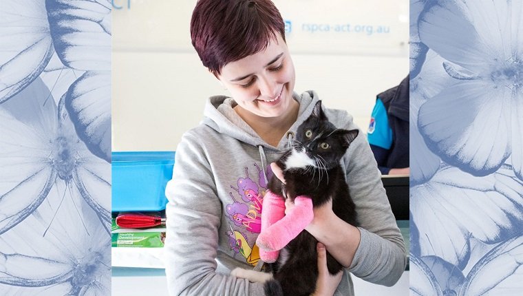 Flipper's new owner holds him