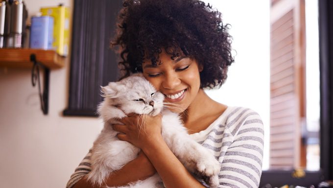 Shot of a beautiful young woman enjoying a cuddle with her cathttp://195.154.178.81/DATA/i_collage/pi/shoots/784178.jpg