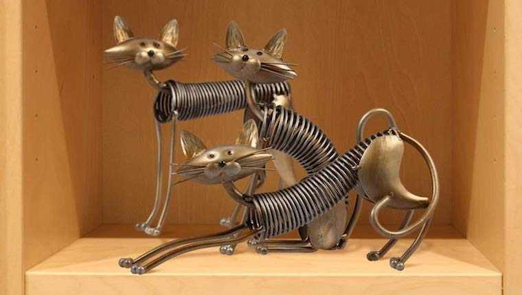 Metal cat coil sculpture