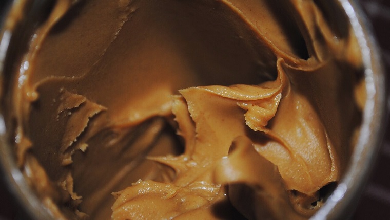 Close-Up Of Peanut Butter In Jar