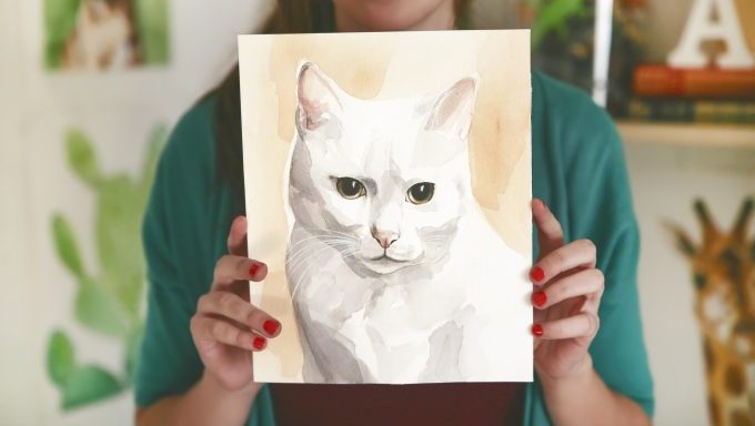 woman holding custom cat portrait
