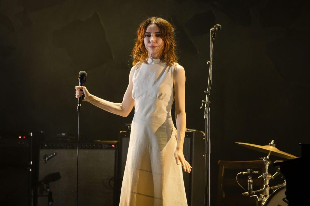 PJ Harvey performing in Berlin. She recently recited a poem about her cat, Garden, penned by the acclaimed rock musician Captain Beefheart.