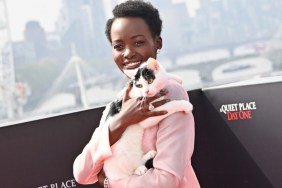 Lupita Nyong'o poses with cat Schnitzel at the London Photocall for "A Quiet Place: Day One" at IET Building: Savoy Place on May 1, 2024 in London, England.